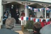 50th anniversary celebration of the Howick and Districts Historical Society. The official party is on the Puhinui verandah. Michael Williams is making a speech.; La Roche, Alan; 20 May 2012; P2022.27.01