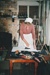Tracy Mulgrew ironing in Briody-McDaniel's cottage.; La Roche, Alan; c2000; P2020.104.14