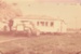 Eckford's homestead on the transporter ready to be moved to Howick Historical Village. ; La Roche, Alan; 13 May 1978; P2021.09.31