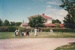 Rosemary McLean, in costume with others playing croquet on a Live Day  in Howick Historical Village.; c1985; P2021.121.04