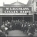 McLaughan's Cycle Shop and the Woman in Red., Clarke, C.E   Waimate New Zealand, 1936, 011-2002-1026-00874