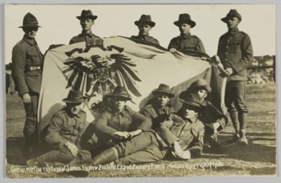 Postcard, 'German War Flag captured at Samoa by New Zealand Expeditionary Force'
; Wilson, William Thomas; 1914-1916; GH023107