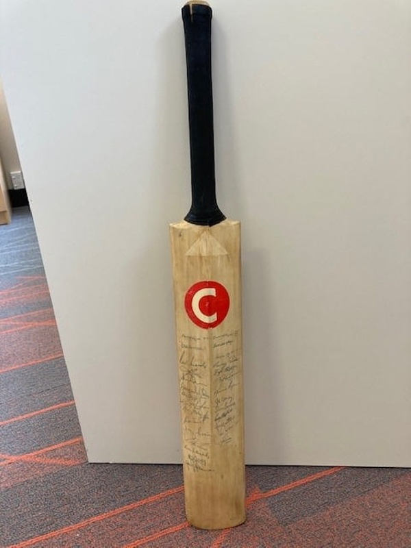 Cricket Bat County brand bat that has been signed by an Australian and
