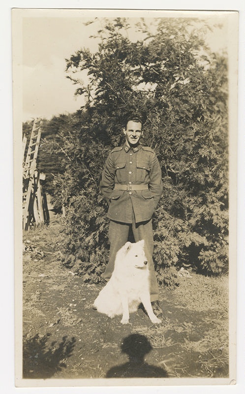 Photograph of Jack Bickley and his dog c 1941