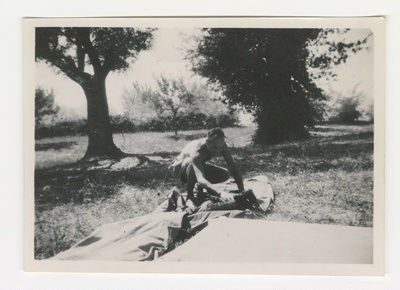Photograph, Allied soldier setting up camp, World War Two. image item