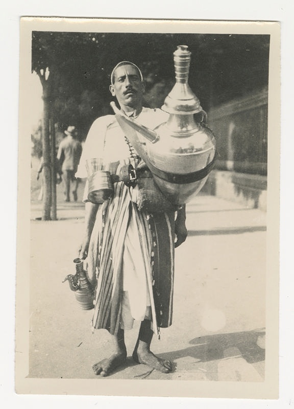 Photograph, North African man with large Urn.1940s.