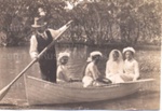 Photo: Deeming wedding, dinghy leaving Orongo with bride and maids.; 97/791