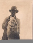 Two photos: a) a man with large snapper. b) two anglers with gamefish at Deepwater Cove; 97/645