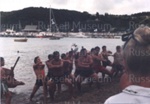 Photo: Paddlers performing a haka, Russell Beach, c1980's; 97/1681/5