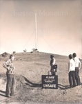 Photo: Flagstaff with warning sign, 1973; 97/1177