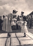 Photo: Queen Elizabeth accepting flowers, Fiji (1953).; Photographer : Tudor Collins; 97/1484