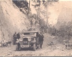 Photo: First car through Russell-Whangarei road and gang from Public Works Department, 1930; 97/1451