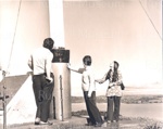 Photo: Viewing damage to flagstaff, 1973; 97/1178