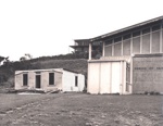 Photo: Catholic Presbytery being dismantled, 1973. Shrine of St. Peter Chanel on the right; 97/1150