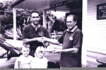 Photograph of Steve Tangiau presenting the adze 00/118 to Russell Museum; Helen Ough Dealy; August 2000; 01/40