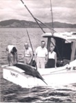 Photo: Lord and Lady Mountbatten with gamefish on "Alma G".; 97/655