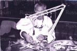 Photo: Eddie Scott, bone carver, Russell Craft Show, 1998; 99/131/1
