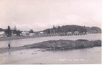 postcard; RM1128b  Russell Looking South along beach