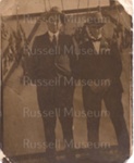 Photo: Two men in suits, reverse "Les Williams".; 05/155