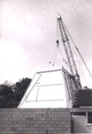 Photo: Crane lifting "Ship Wing" roof in place, Russell Museum, 1970; 97/1557