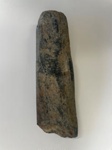 Roughly worked stone, 7" long; 18/114
