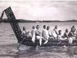 Photo: Canoe and paddlers, Waitangi celebrations, 1940; 97/1335