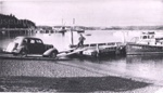 Photo: Neville Fuller loading car onto barge, Fuller's car ferry, Russell to Paihia; 97/961