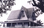 Photo: Russell Police Station, iron roof being replaced with shingles, 1975; 97/1067