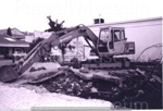 Photo: Te Maiki Takeaways with Russell Earthmovers digger, 1998; 98/911/30