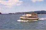 Postcard: "Bay Belle" with visitors on Cream Trip, Bay of Islands; 11/46