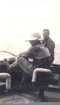 Photo: Zane Grey playing a gamefish, c1931; 98/329/5