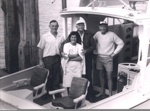 Photo: Francis Arlidge (R) "Alma G" and his wife Millie with an American angler and his chauffeur (L), Russell wharf.; 97/653