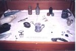 Photo: Case 9 - "Finds in Russell" bottles, nails etc; 97/117/5