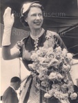 Photo: Queen Elizabeth with flowers waving. (1953); Photographer : Tudor Collins; 97/1536