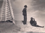 Photo: Harry King and visitor on lookout above Whangamumu; 97/1431