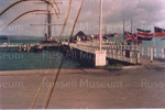 Photo: R Tucker Thompson at Russell wharf, c1980's; 97/1675