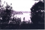 Photo: Mill Island and Matauwhi Bay headland, 1997; 97/1766