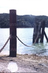 Photo: Ferry ramp with guide posts and chains, Okiato, 1997; 97/1751/2