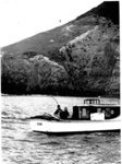 Photo: Launch Ozone with Cape Brett lighthouse in the background c1929; 13/066