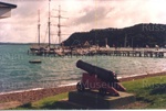 Photo: Russell with cannon in foreground and R Tucker Thompson at wharf; 97/1671