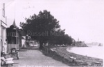 Photo: Russell waterfront showing store, Clendon House and Gables; 97/875