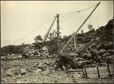 Photograph: Hand crane no. 5, Auckland Harbour Board quarry on Rangitoto Island, 1919.; Auckland Harbour Board. Engineer's Dept.; 2010.132.287
