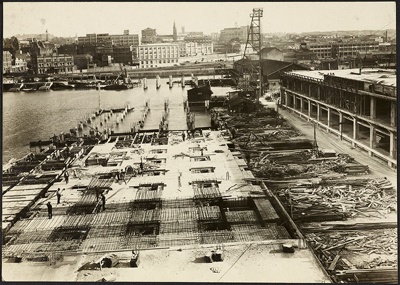 Photograph: Construction of Princes Wharf, 1923.; Auckland Harbour Board. Engineer's Dept.; 2010.132.47