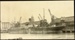 Photograph: Six cranes working SS DURHAM, 1922.; Auckland Harbour Board. Engineer's Dept.; 2010.132.302