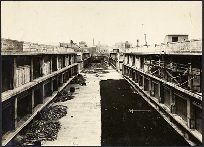 Photograph: Construction of Princes Wharf, 1920s.; Auckland Harbour Board. Engineer's Dept.; 2010.132.45
