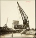 Photograph: Floating crane placing bridge, Eastern Vehicular Ferry Landing, 1928.; Auckland Harbour Board. Engineer's Dept.; 2010.132.170