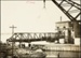 Photograph: Floating crane placing bridge, Eastern Vehicular Ferry Landing, 1928.; Auckland Harbour Board. Engineer's Dept.; 2010.132.171