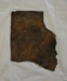 Metal fragment: piece of sheet metal ex HMS Orpheus (?); L1994.351.410