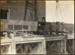 Photograph: Floating crane lifting inter-shed Queens Wharf, 1913.; Auckland Harbour Board. Engineer's Dept.; 2010.132.235
