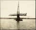 Photograph: Floating crane placing bridge, Western Vehicular Ferry Landing, 1929.; Auckland Harbour Board. Engineer's Dept.; 2010.132.208